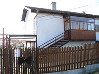 House On A Lake Near The Sea